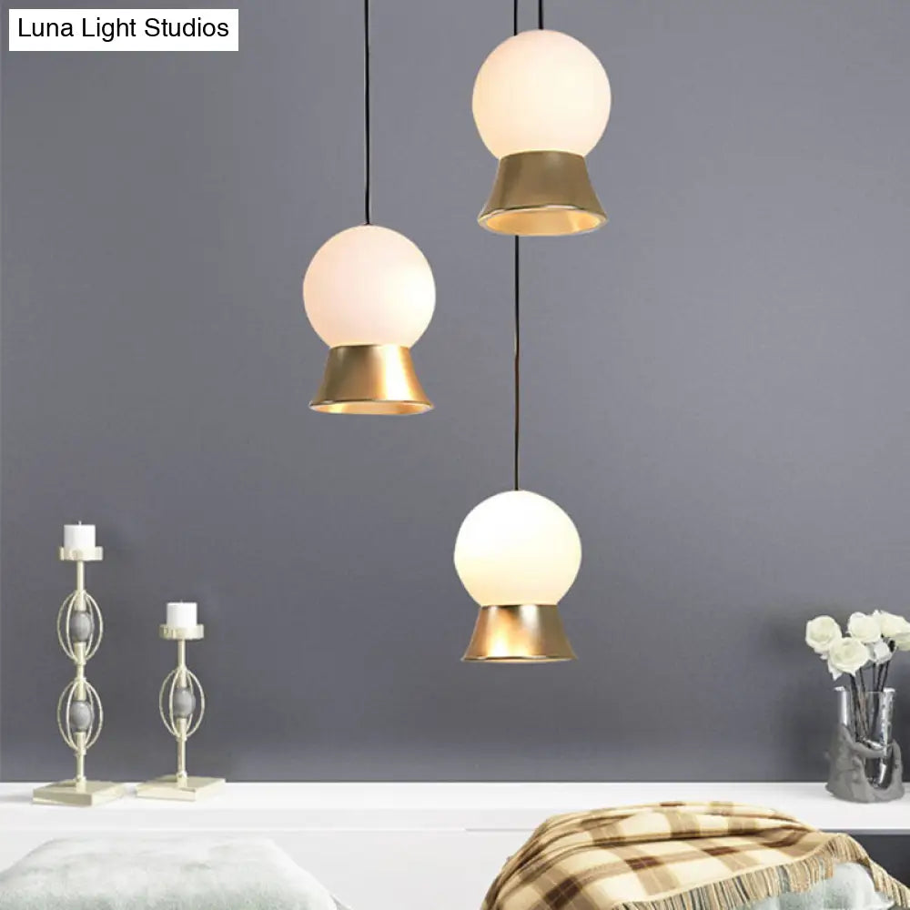 Modern White Glass Globe Pendant Light With Gold/Black Metal Shade