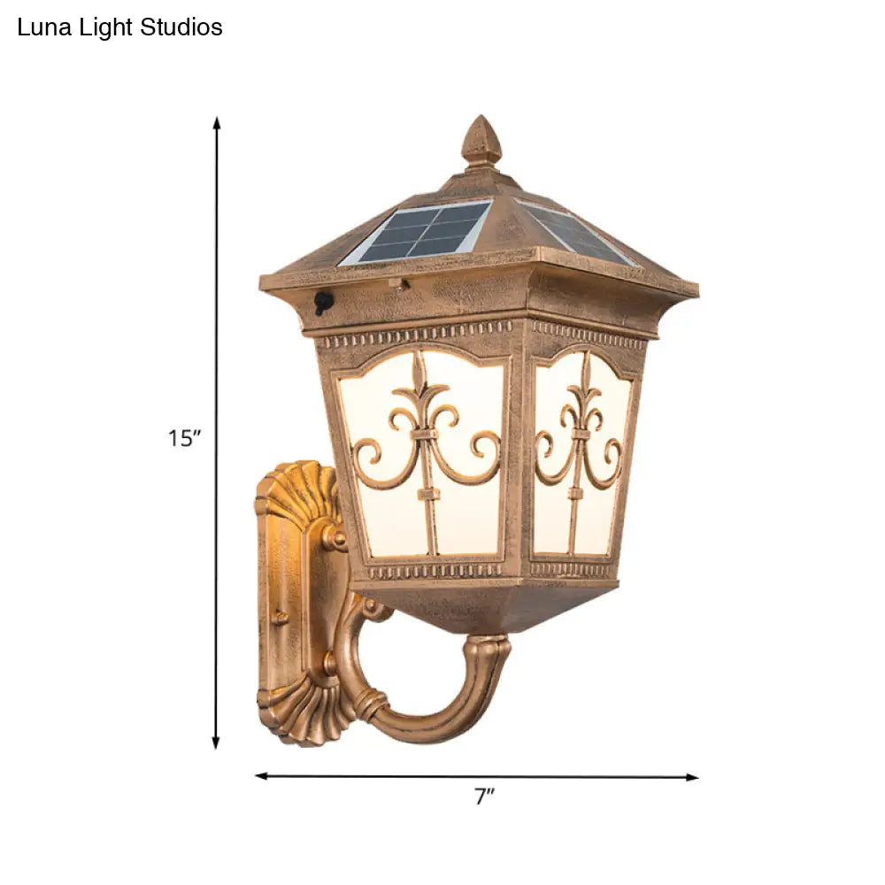 Quartet Religion Wall Lamp: Rustic 1-Light Sconce With Solar Panel Brass Finish