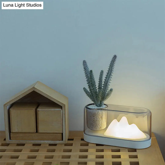 Rechargeable Led Table Lamp: Plastic Mountain Night Light With Artistic Oval Cover And Storage Cup