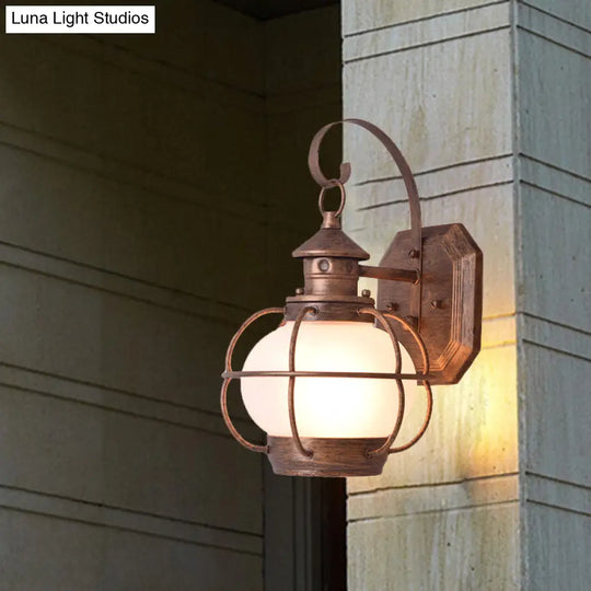 Retro Coffee/Bronze Lantern Wall Light With Wire Cage - Outdoor 1 Head Lighting In White/Clear Glass