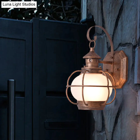 Retro Coffee/Bronze Lantern Wall Light With Wire Cage - Outdoor 1 Head Lighting In White/Clear Glass