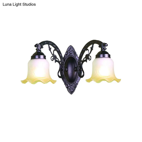 Retro Floral Wall Sconce With Frosted Glass & Metallic Curvy Arm - Black