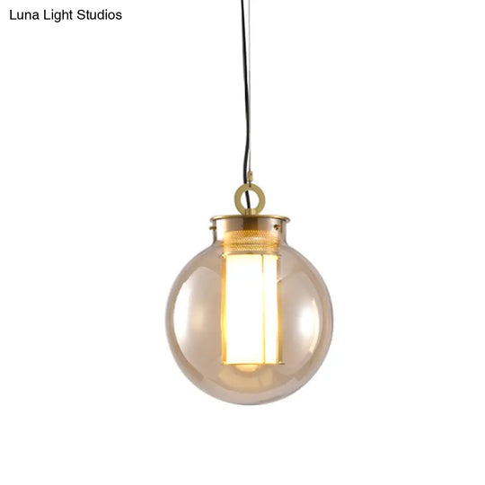 Retro Gold Pendulum Light With Amber Glass Sphere/Ellipse/Oblong Design And Tube Frame Insert