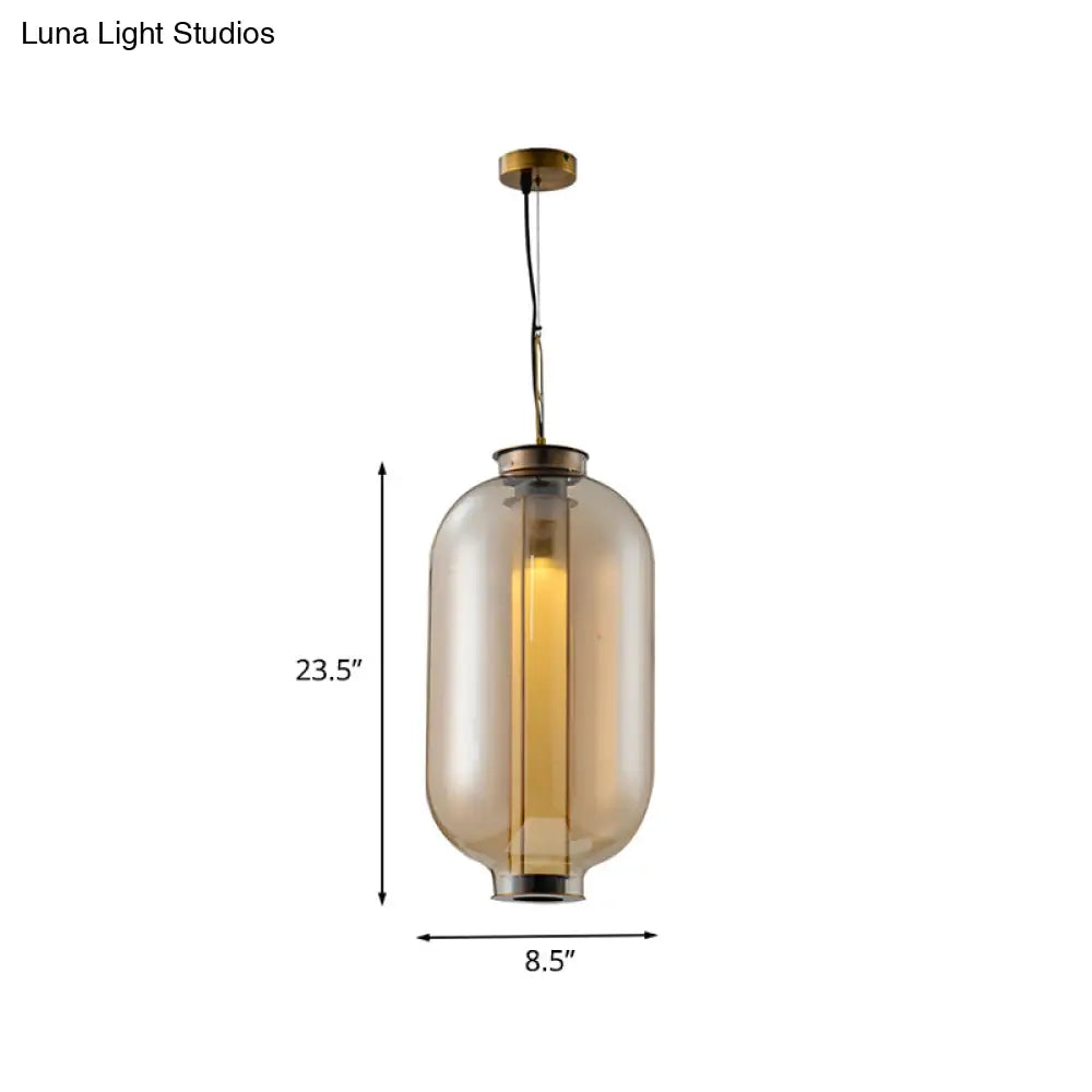 Retro Gold Pendulum Light With Amber Glass Sphere/Ellipse/Oblong Design And Tube Frame Insert