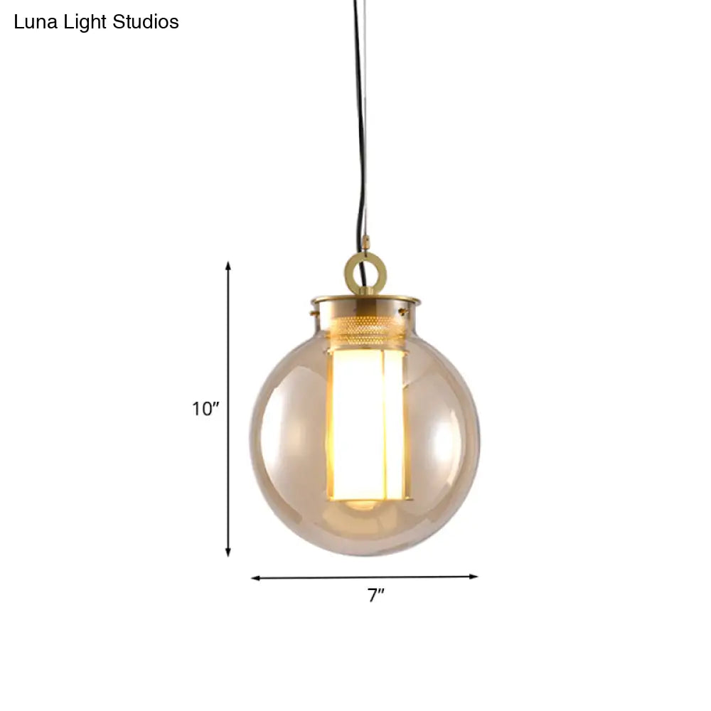 Retro Gold Pendulum Light With Amber Glass Sphere/Ellipse/Oblong Design And Tube Frame Insert