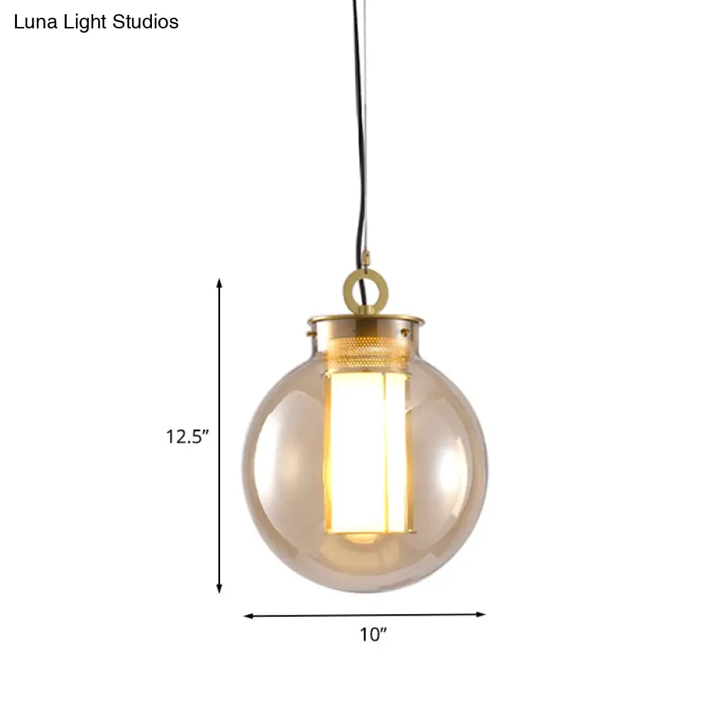 Retro Gold Pendulum Light With Amber Glass Sphere/Ellipse/Oblong Design And Tube Frame Insert