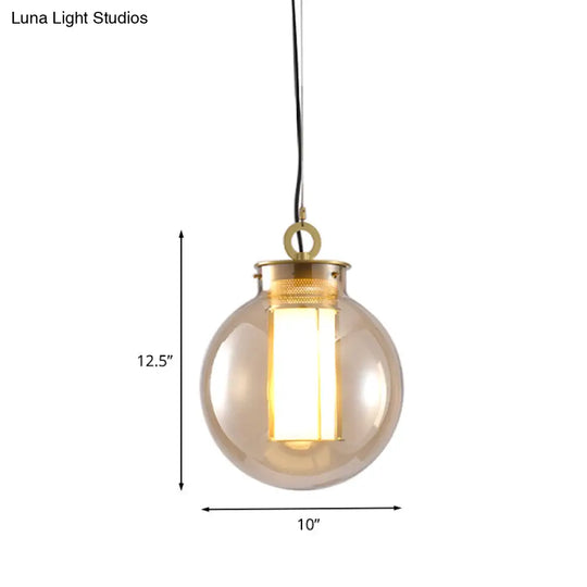 Retro Gold Pendulum Light With Amber Glass Sphere/Ellipse/Oblong Design And Tube Frame Insert