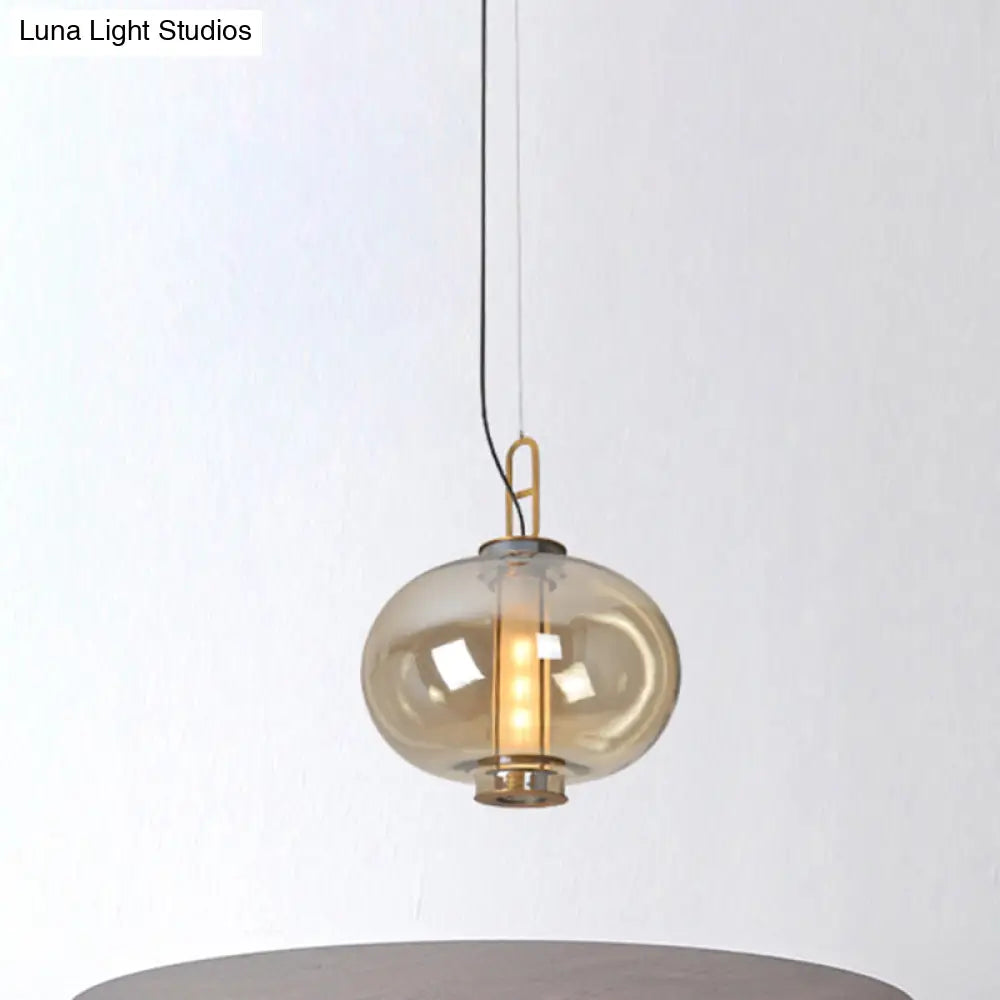 Retro Gold Pendulum Light With Amber Glass Sphere/Ellipse/Oblong Design And Tube Frame Insert