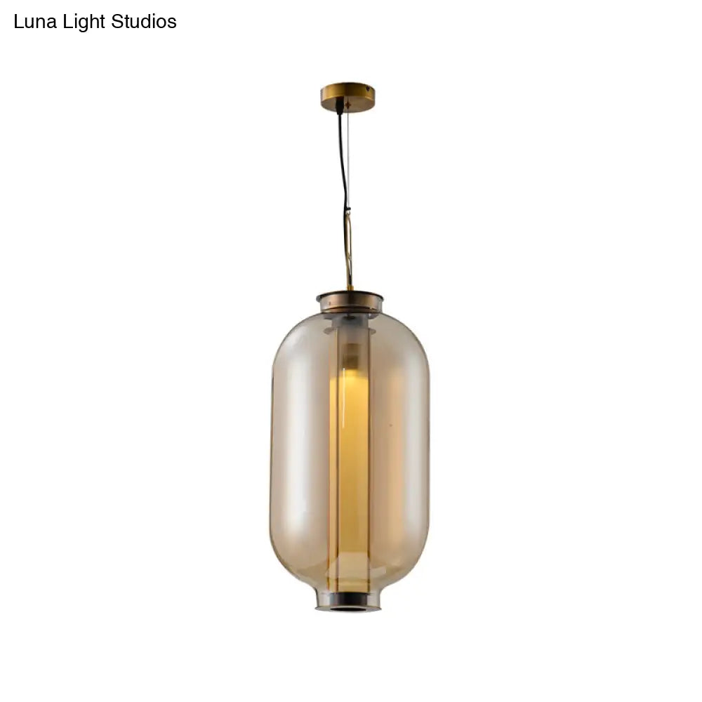 Retro Gold Pendulum Light With Amber Glass Sphere/Ellipse/Oblong Design And Tube Frame Insert