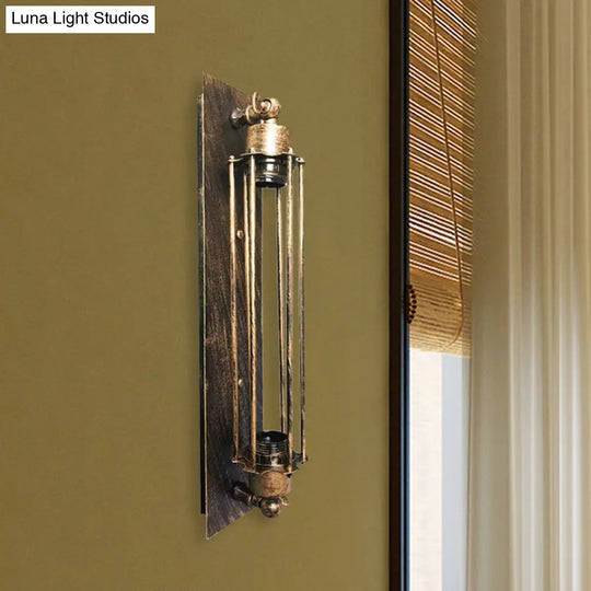 Retro Industrial Wall Sconce Lighting: Linear Wrought Iron Lamp With Cage Shade In Aged Brass