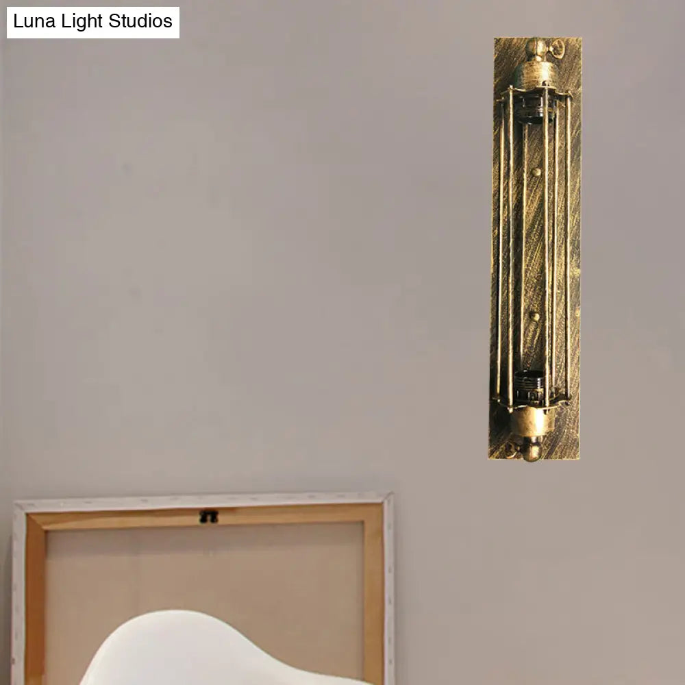 Retro Industrial Wall Sconce Lighting: Linear Wrought Iron Lamp With Cage Shade In Aged Brass