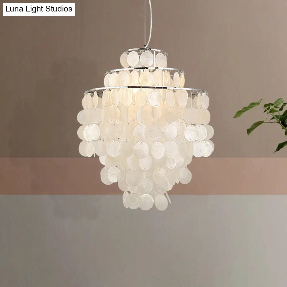 Retro Shell Silver Pendant Lighting For Tiered Dining Rooms