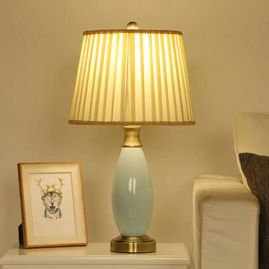 Retro Style Ridged Cone Night Light Fabric Desk Lamp With Blue Ceramic Oval Decor