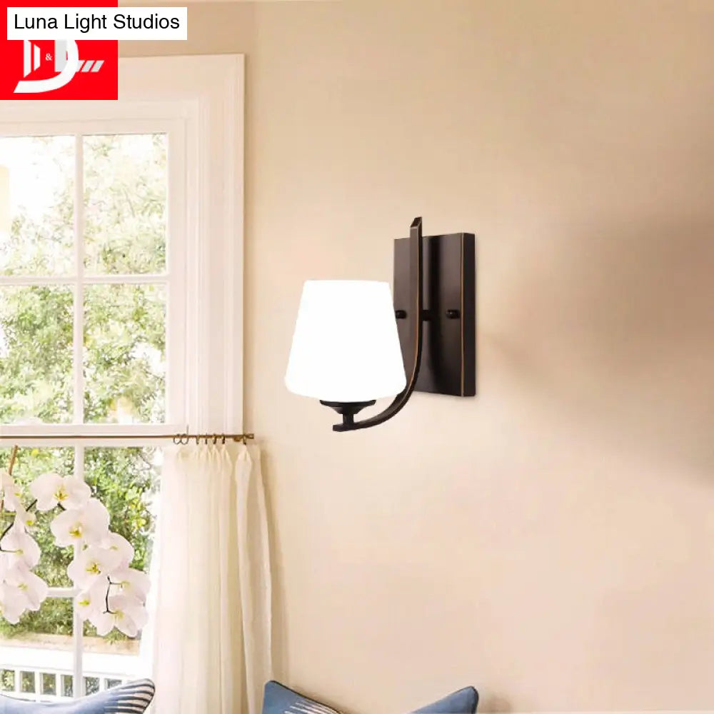 Retro Style Wall Sconce With Black Cup-Like Glass Shade Single Bulb And Metal Backplate