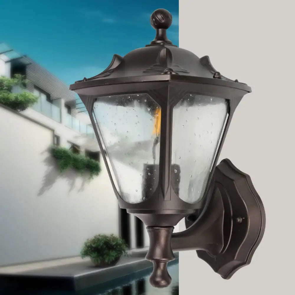 Rural Style Outdoor Lantern Wall Sconce With Clear Bubble Glass - 1-Head Black Surface