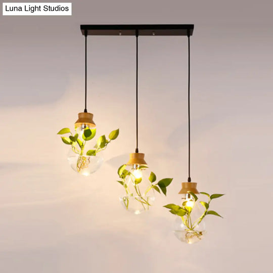 Rustic Clear Glass 3-Head Pendant Light With Bulb-Shaped Suspension For Restaurants And Planters