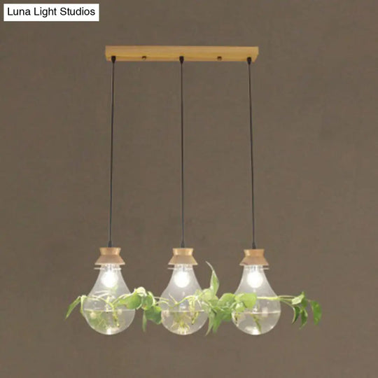 Rustic Clear Glass 3-Head Pendant Light With Bulb-Shaped Suspension For Restaurants And Planters 3 /