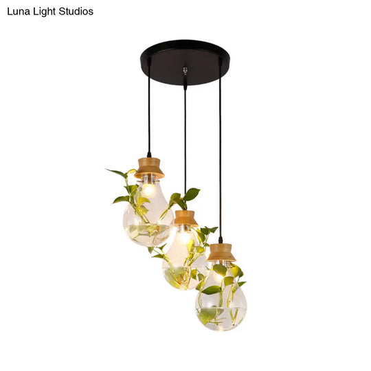 Rustic Clear Glass 3-Head Pendant Light With Bulb-Shaped Suspension For Restaurants And Planters