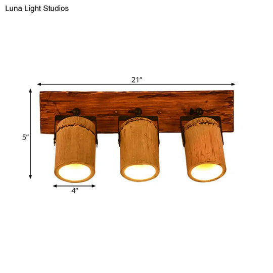 Rustic Bamboo Wall Sconce With Linear Wood Backplate