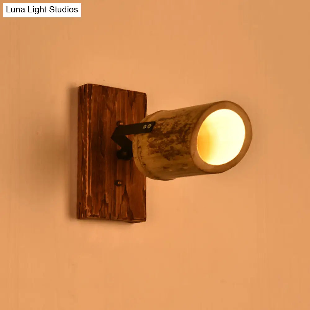 Rustic Bamboo Wall Sconce With Linear Wood Backplate