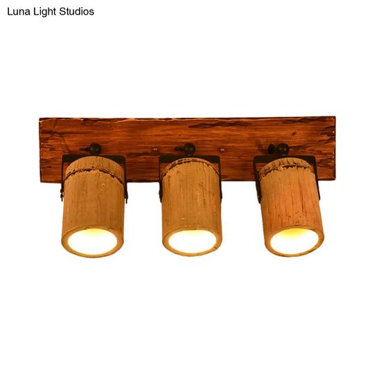 Rustic Bamboo Wall Sconce With Linear Wood Backplate