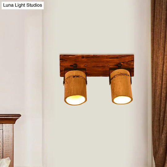 Rustic Bamboo Wall Sconce With Linear Wood Backplate