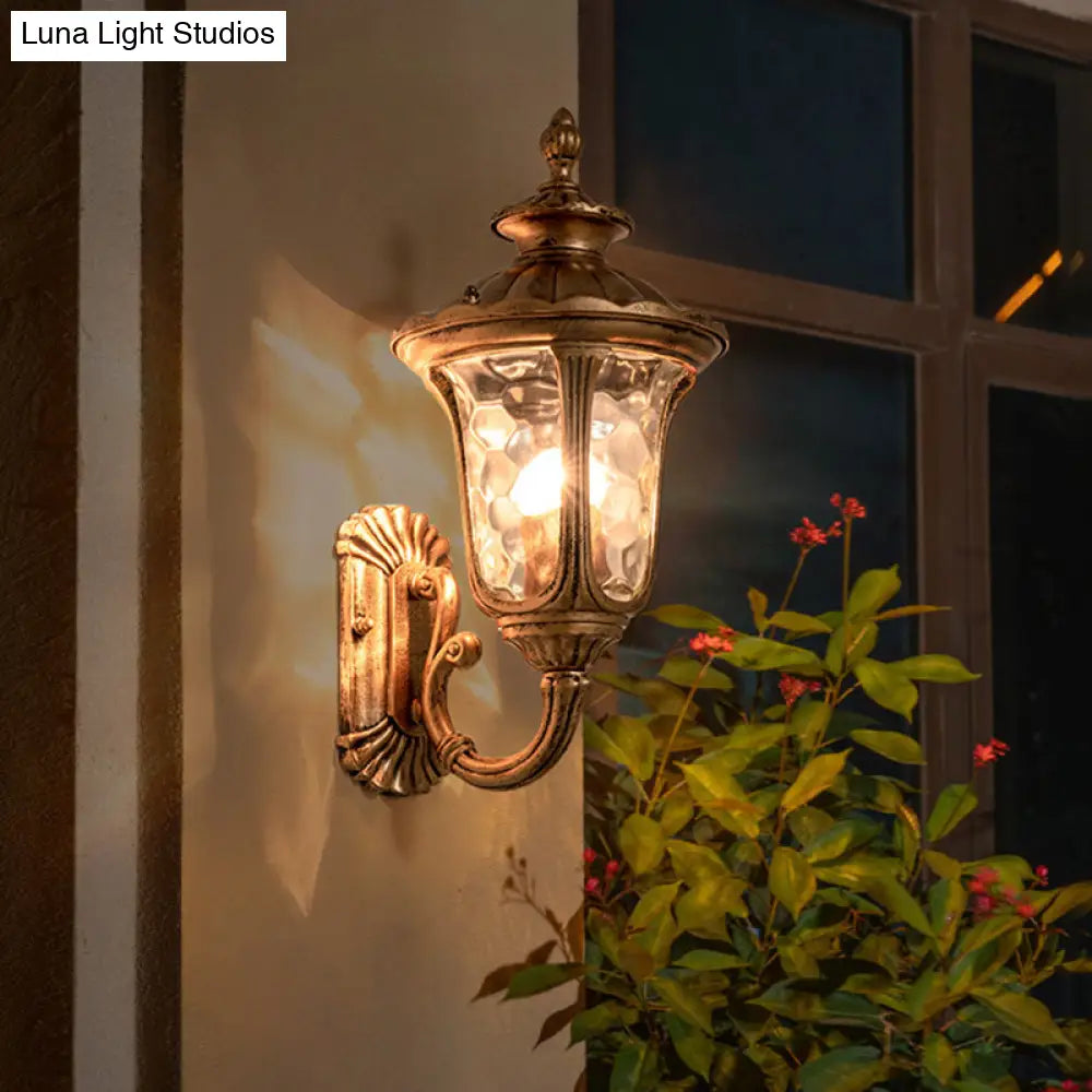 Rustic Brass Wall Mounted Sconce With Water Glass Acorn Design - 1 Bulb Light Fixture