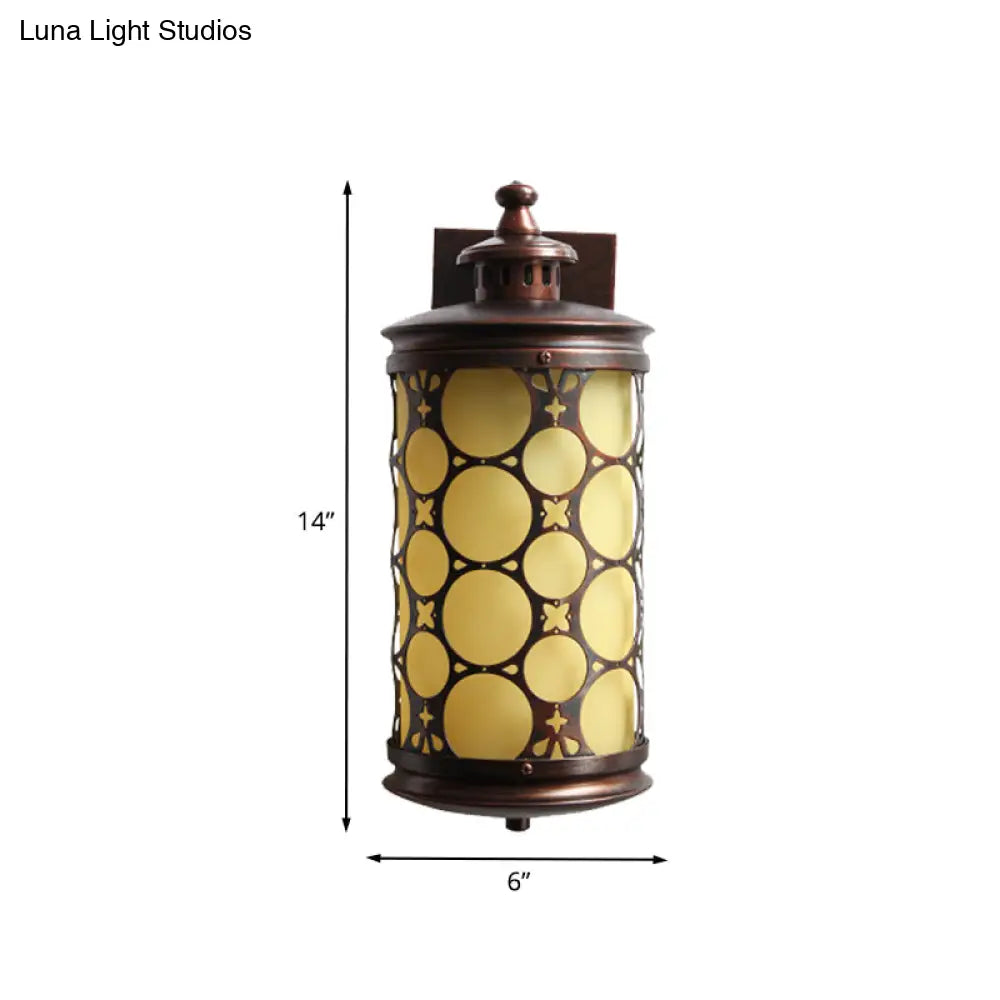 Rustic Bronze Wall Sconce Lamp - Single Light Yellow Glass With Circle Design