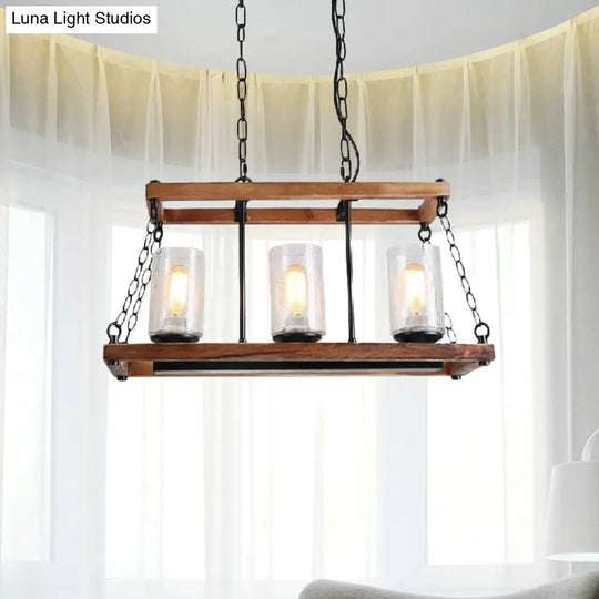 Rustic Brown Seeded Glass Island Light With 3-Bulb Cylinder Design And Wooden Trapezoid Guard For