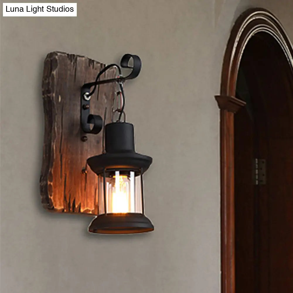 Rustic Clear Glass Caged One-Light Sconce With Wooden Backplate - Black Finish