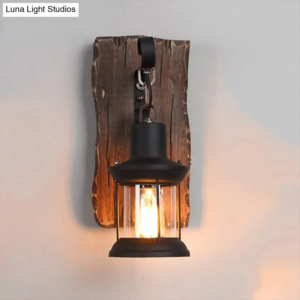 Rustic Clear Glass Caged One-Light Sconce With Wooden Backplate - Black Finish