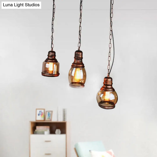 Rustic Clear Glass Pendant Light For Coffee Shop Ceiling - 1 Rust Bottle Shade Multi Linear Canopy