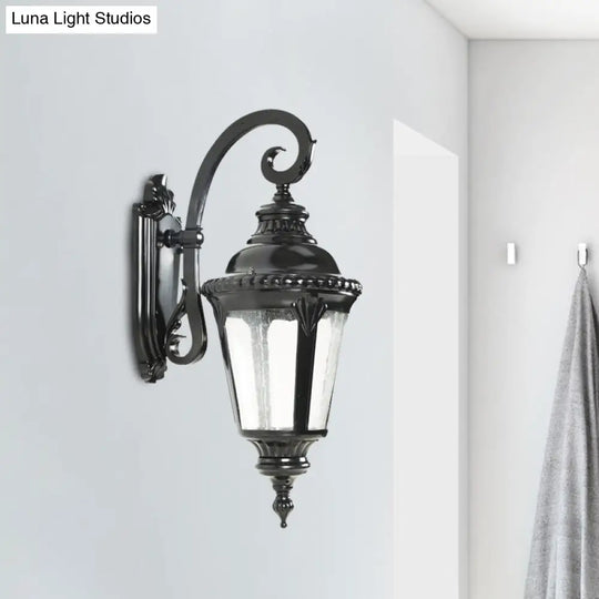 Rustic Courtyard Wall Lighting: 1-Light Sconce With Urn Clear Seeded Glass Shade In Black