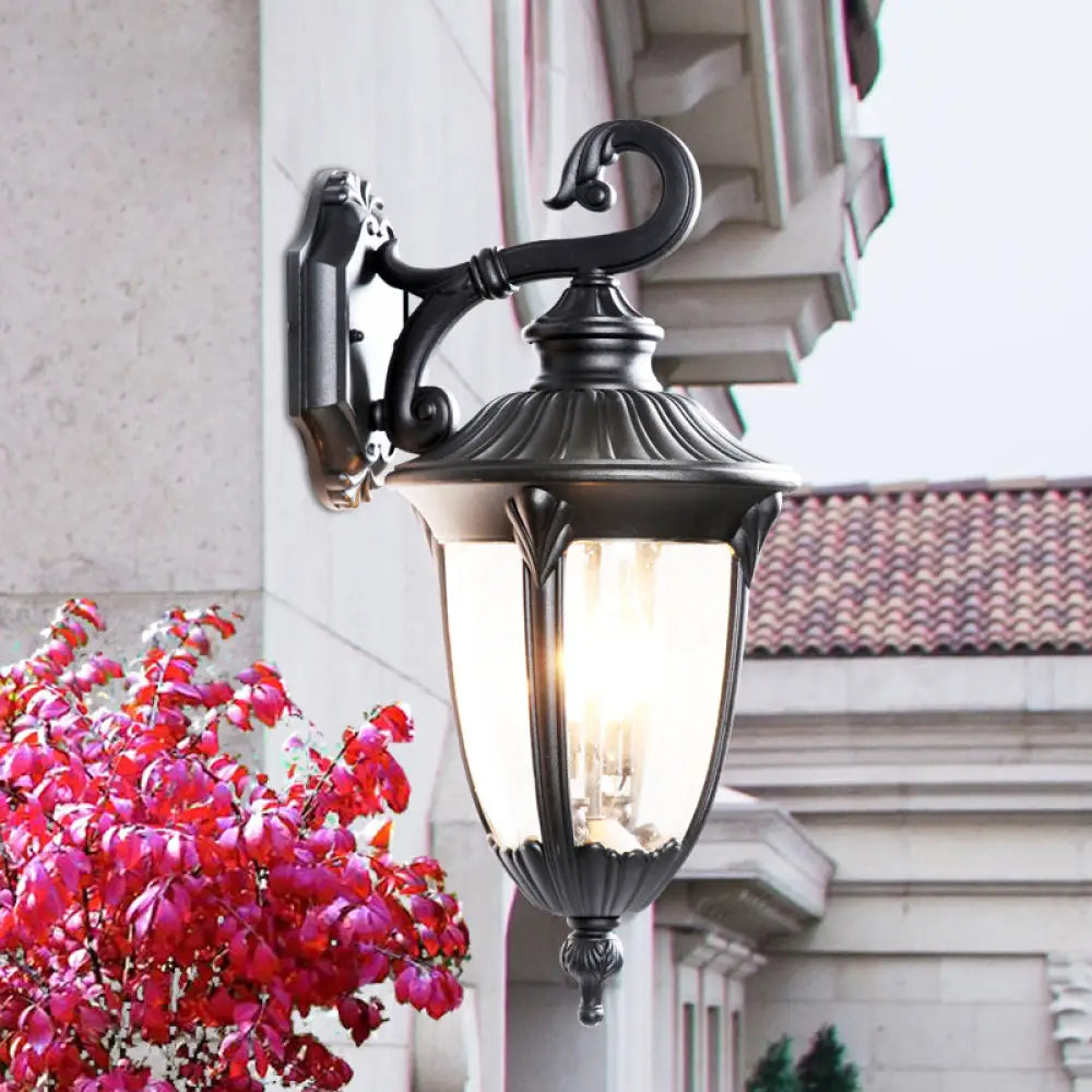 Rustic Outdoor Wall Lamp: Clear Bubble Glass Black Sconce Urn With Curling Arm [1-Head Fixture]