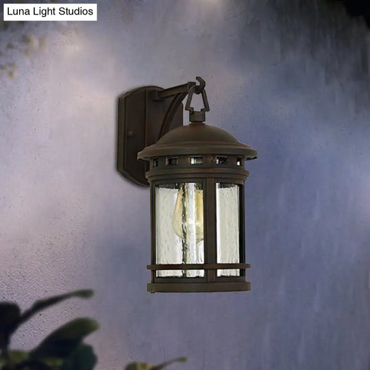 Rustic Outdoor Wall Lantern Sconce With Clear Seeded Glass Metal Frame In Coffee/Black - 1 Light