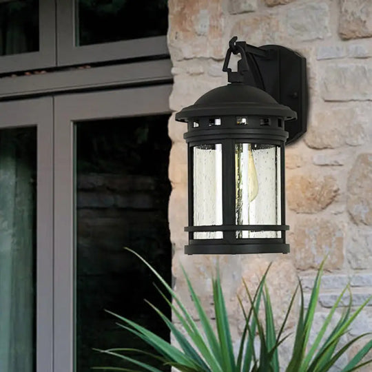 Rustic Outdoor Wall Lantern Sconce With Clear Seeded Glass Metal Frame In Coffee/Black - 1 Light