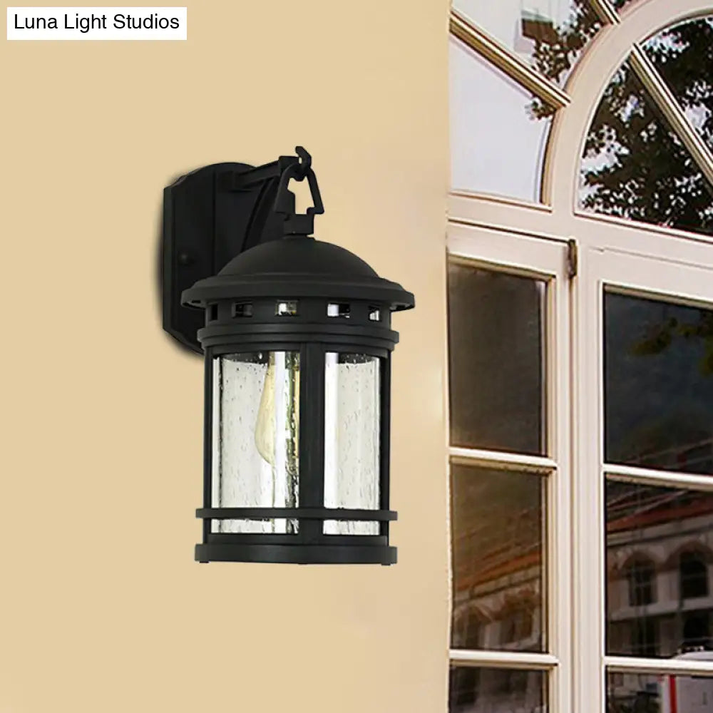 Rustic Outdoor Wall Lantern Sconce With Clear Seeded Glass Metal Frame In Coffee/Black - 1 Light