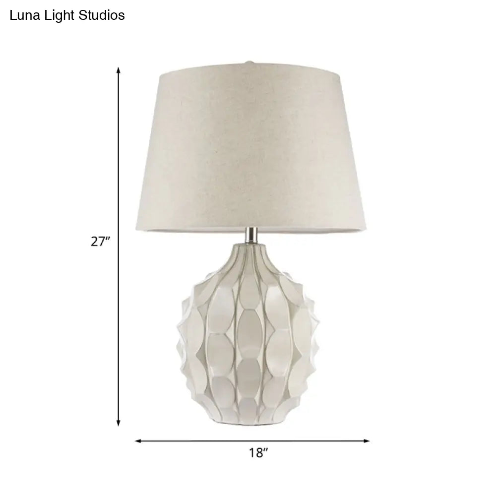 Rustic Pinecone Ceramic Nightstand Lamp With Tapered Drum Shade - White