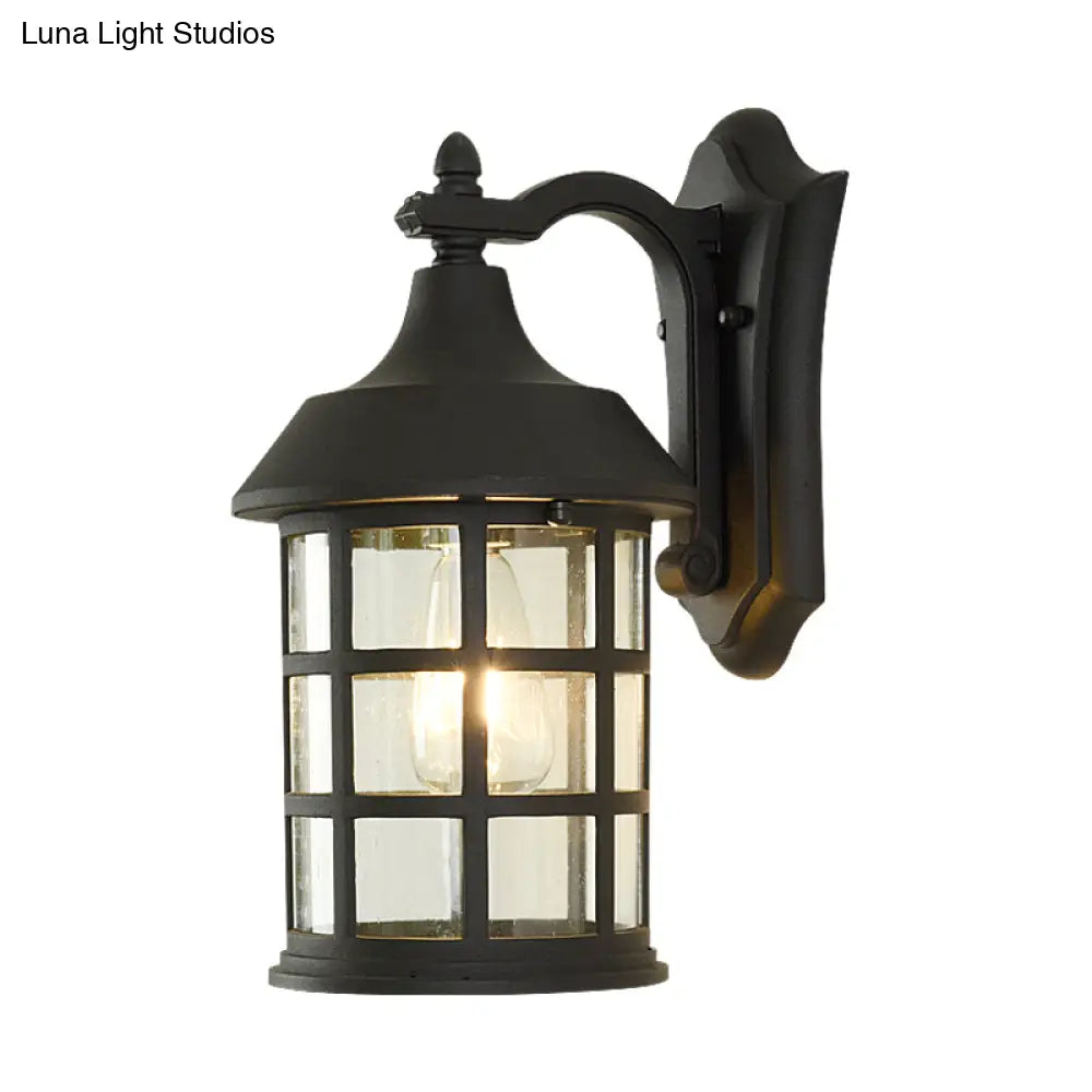 Rustic Single Bulb Wall Sconce With Clear Glass & Metal Frame Ideal For Courtyards