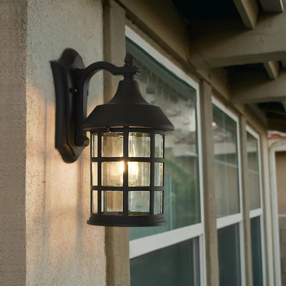 Rustic Single Bulb Wall Sconce With Clear Glass & Metal Frame Ideal For Courtyards Black