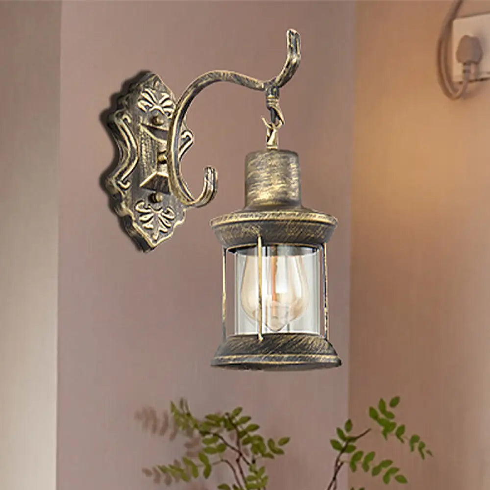 Rustic Wall Mounted Kerosene Light Fixture With Carved Pattern - Aged Bronze Finish Clear Glass