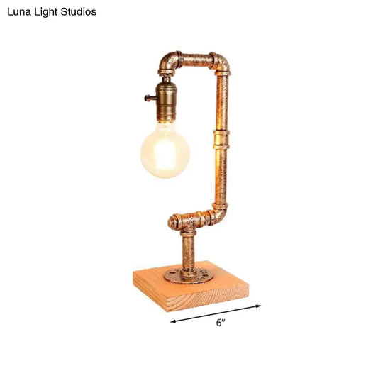 Rustic Wrought Iron Table Lamp With Stylish Open Bulb - Bedroom Lighting In Bronze