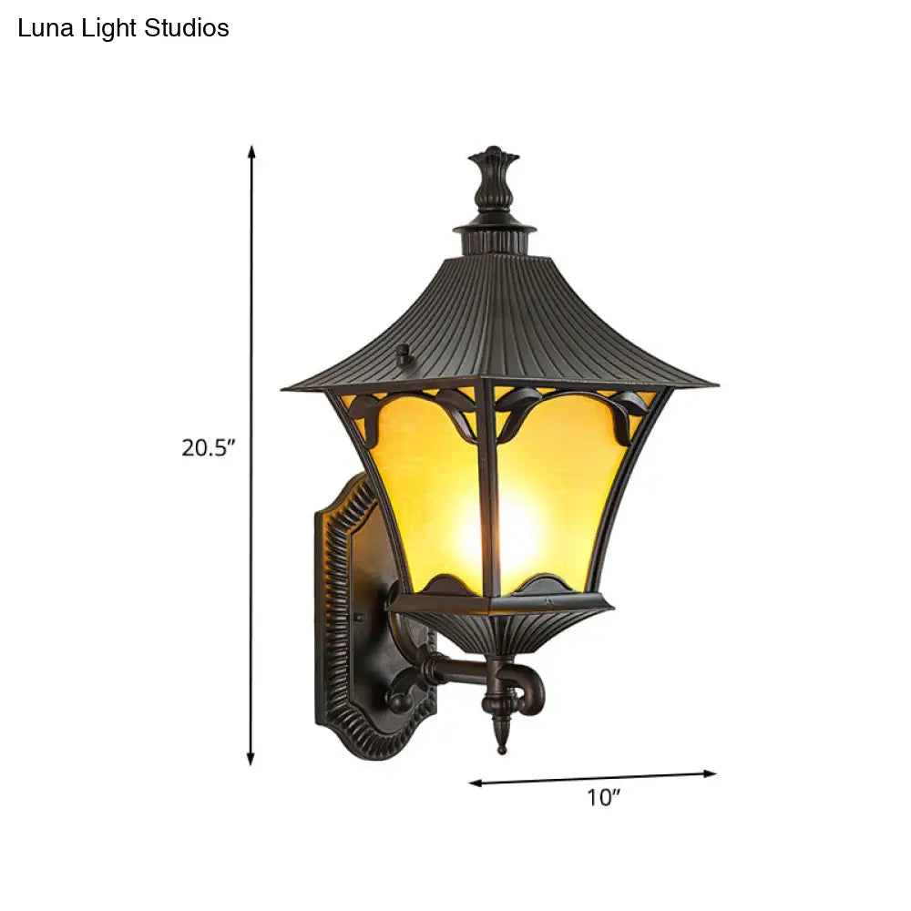 Rustic Yellow Glass Wall Sconce - Outdoor 1-Light Fixture