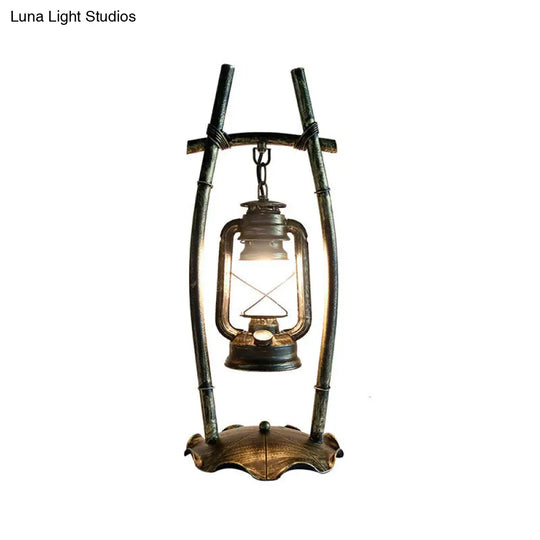 Opal Glass Kerosene Table Light With Antiqued Brass Frame And Farmhouse-Inspired Design