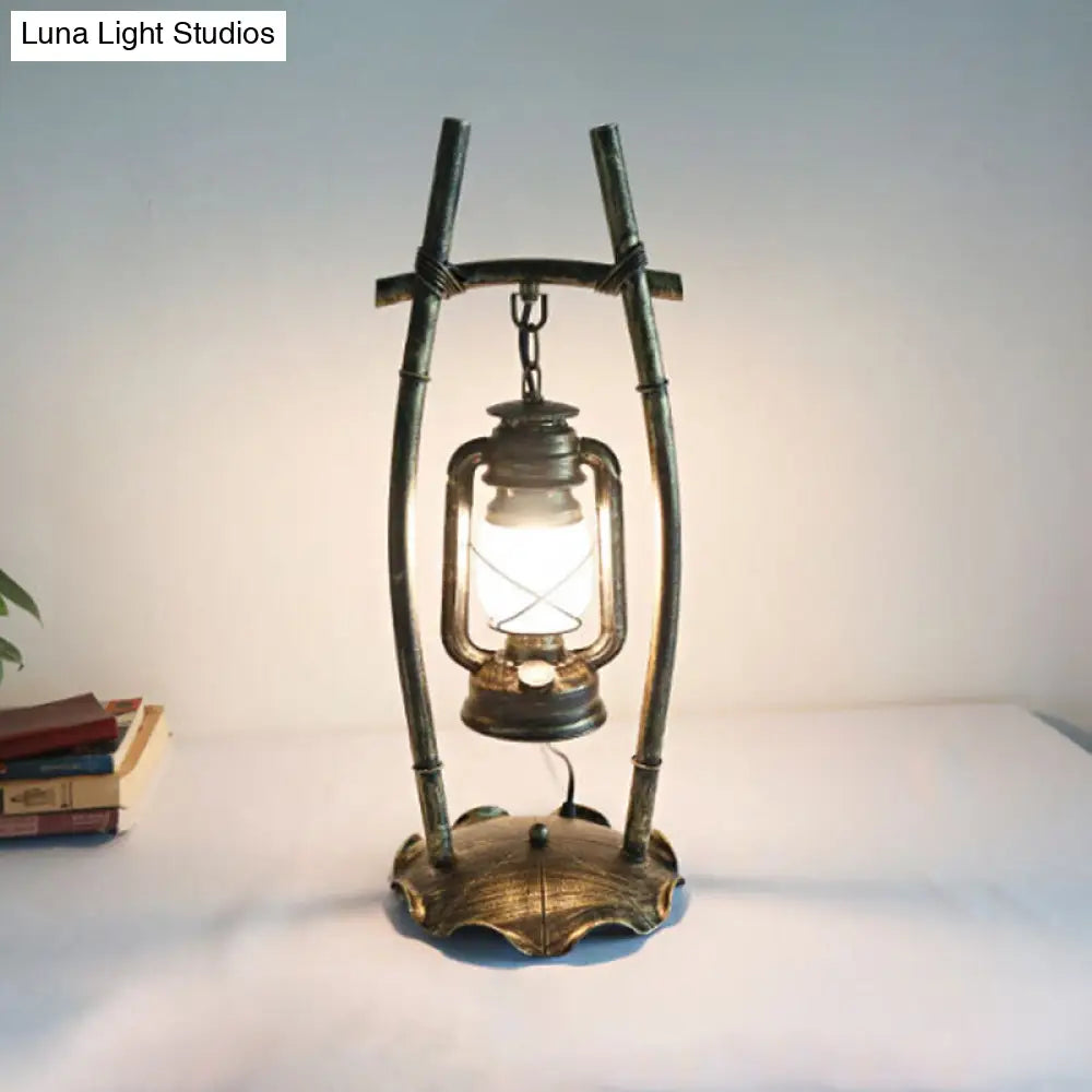 Opal Glass Kerosene Table Light With Antiqued Brass Frame And Farmhouse-Inspired Design