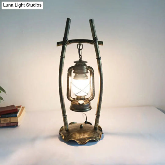 Opal Glass Kerosene Table Light With Antiqued Brass Frame And Farmhouse-Inspired Design