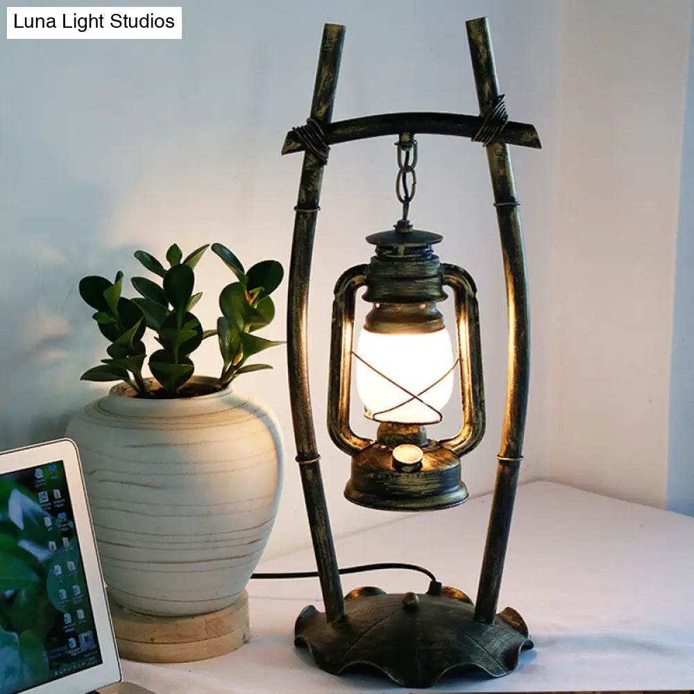 Opal Glass Kerosene Table Light With Antiqued Brass Frame And Farmhouse-Inspired Design