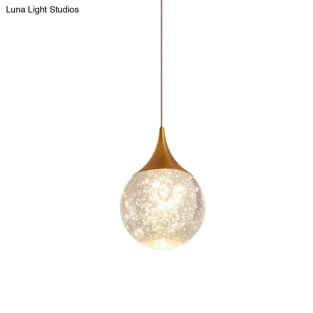 Sleek Crystal Seeded Suspension Lamp: Elegant Bedroom Lighting Solution