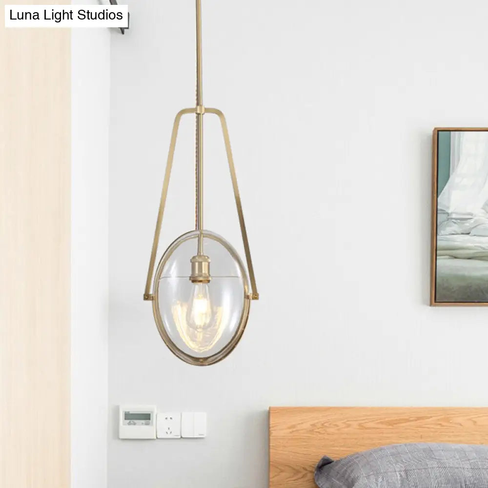 Sleek Gold Elliptical Hanging Ceiling Light With Clear Glass Drop - Ideal For Dining Room 1 Head