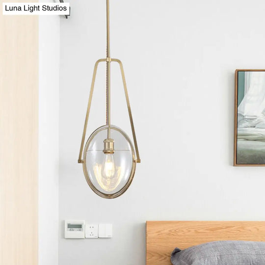 Sleek Gold Elliptical Hanging Ceiling Light With Clear Glass Drop - Ideal For Dining Room 1 Head